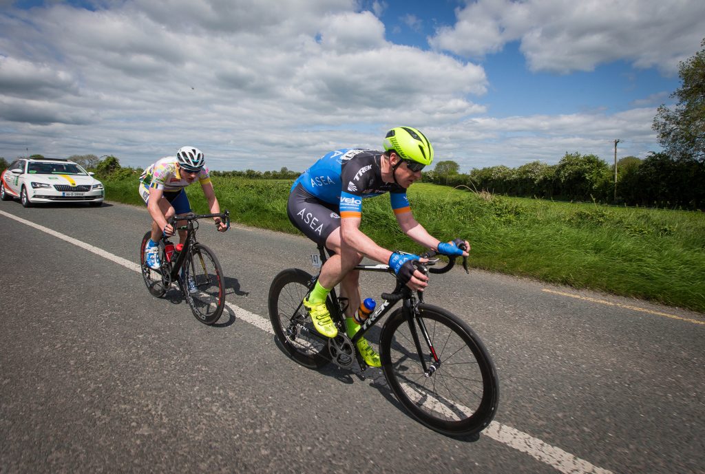 Eventual Stage winner Eoin Morton, UCD Fitz Cycles, makes his way out of Bruff behind eventual second place Bryan McCrystal, Asea Wheelworx Photo: ©INPHO/Ryan Byrne